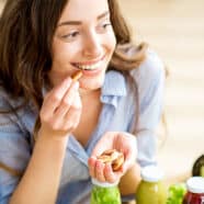 woman with diabetes snacking on nuts