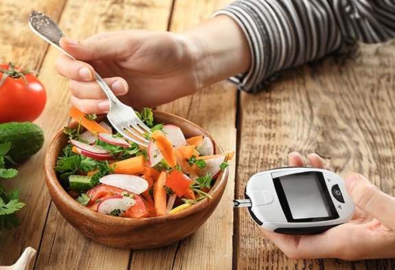 using a glucometer to check blood sugar levels