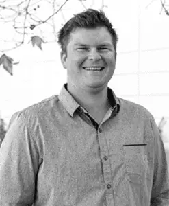 Black and white portrait of Ryan Neibert