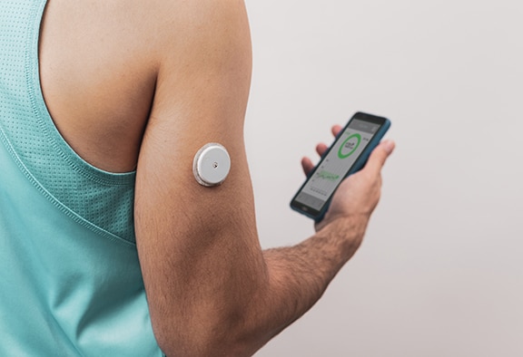 man-wearing-cgm-sensor